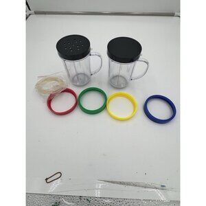 magic bullet 2 cups with handle , lids, multi color rings and seals NEW CONDITIO
